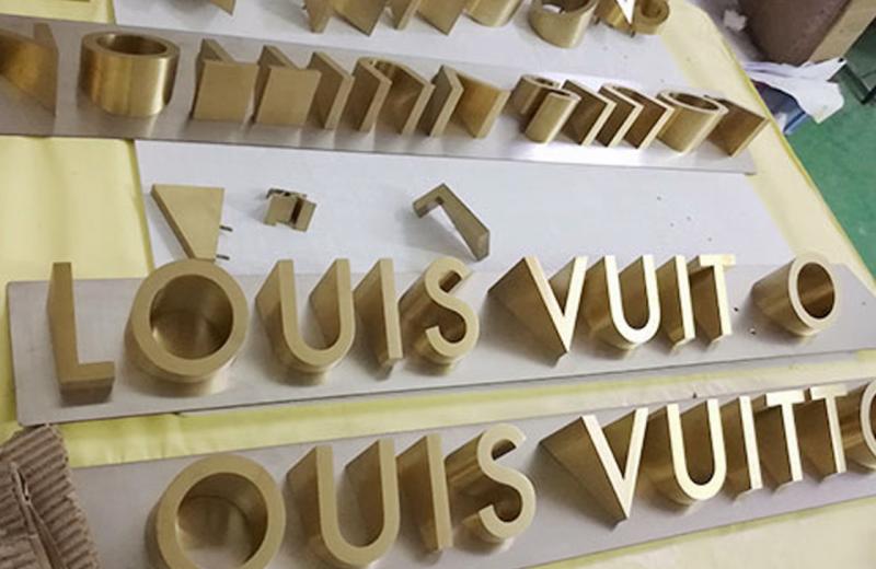 Lv-irrugular-metal-brass-signage