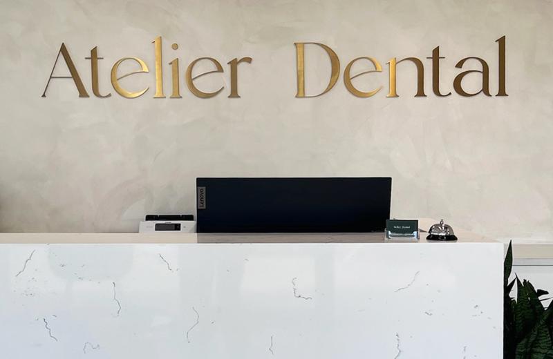 atelier-dental-brass-signage-installed