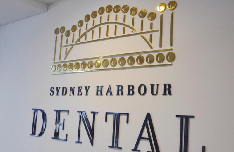 sydney harbour dental metal sign reception wall