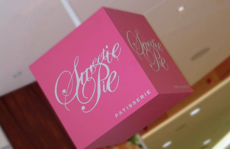 pink-cube-sign-retail