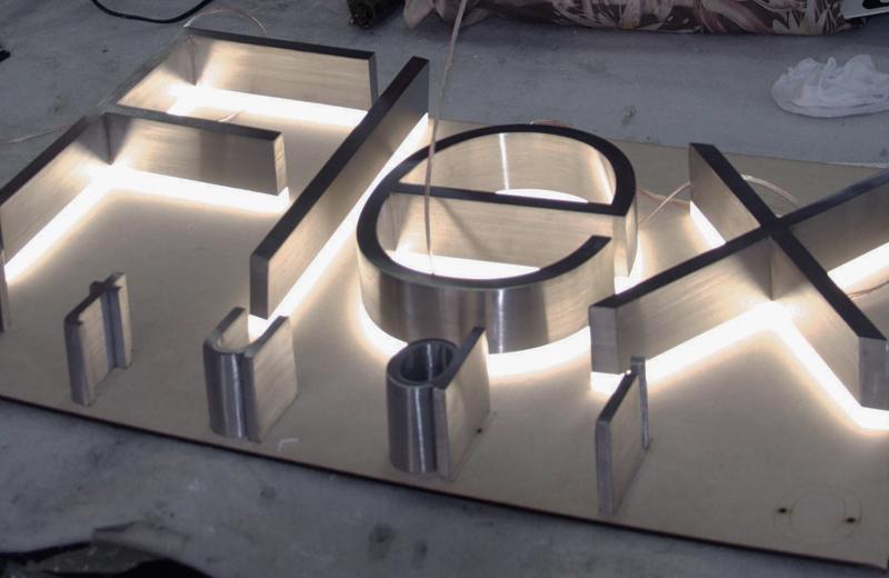 thick-fabricated-stainless-steel-signage-with-back-lit-illumination